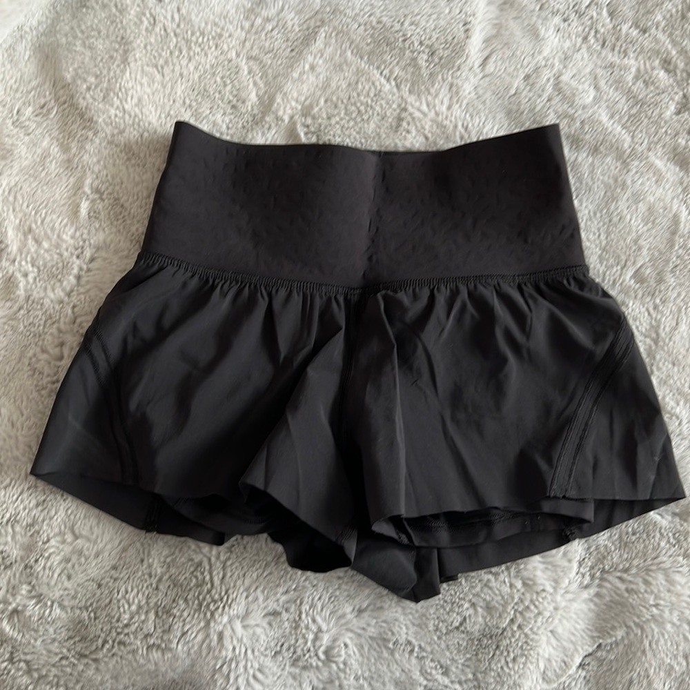 NWOT Lululemon shorts. Black. Size 4